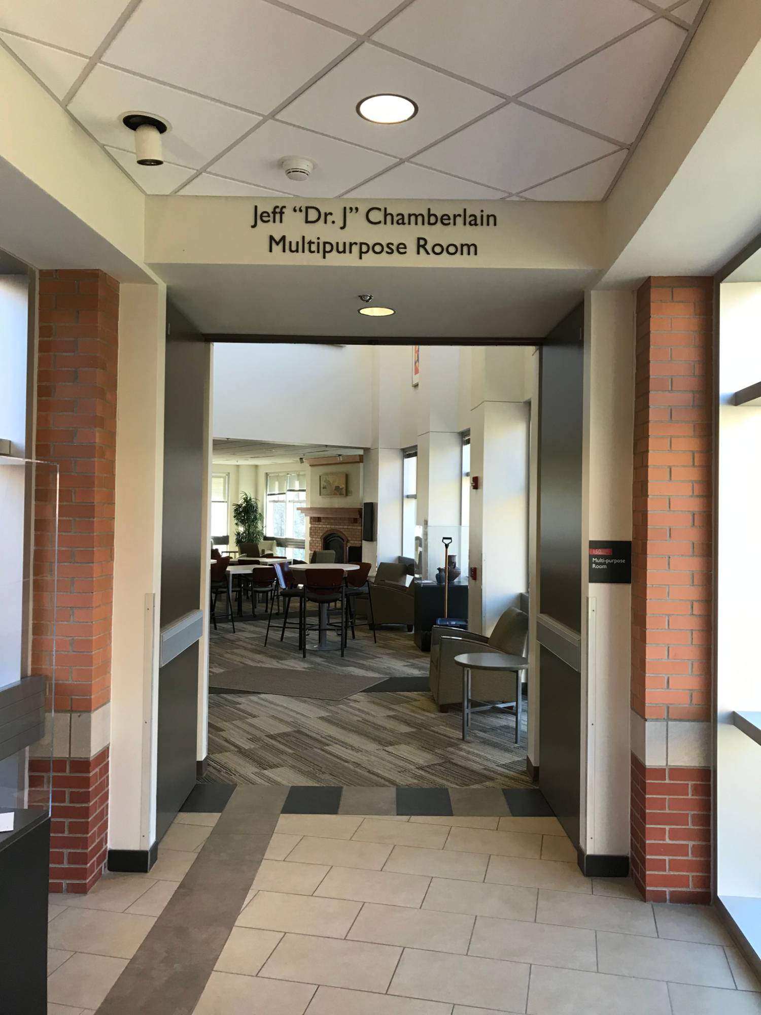 new sign at the entrance to the Chamberlain Multipurpose Room